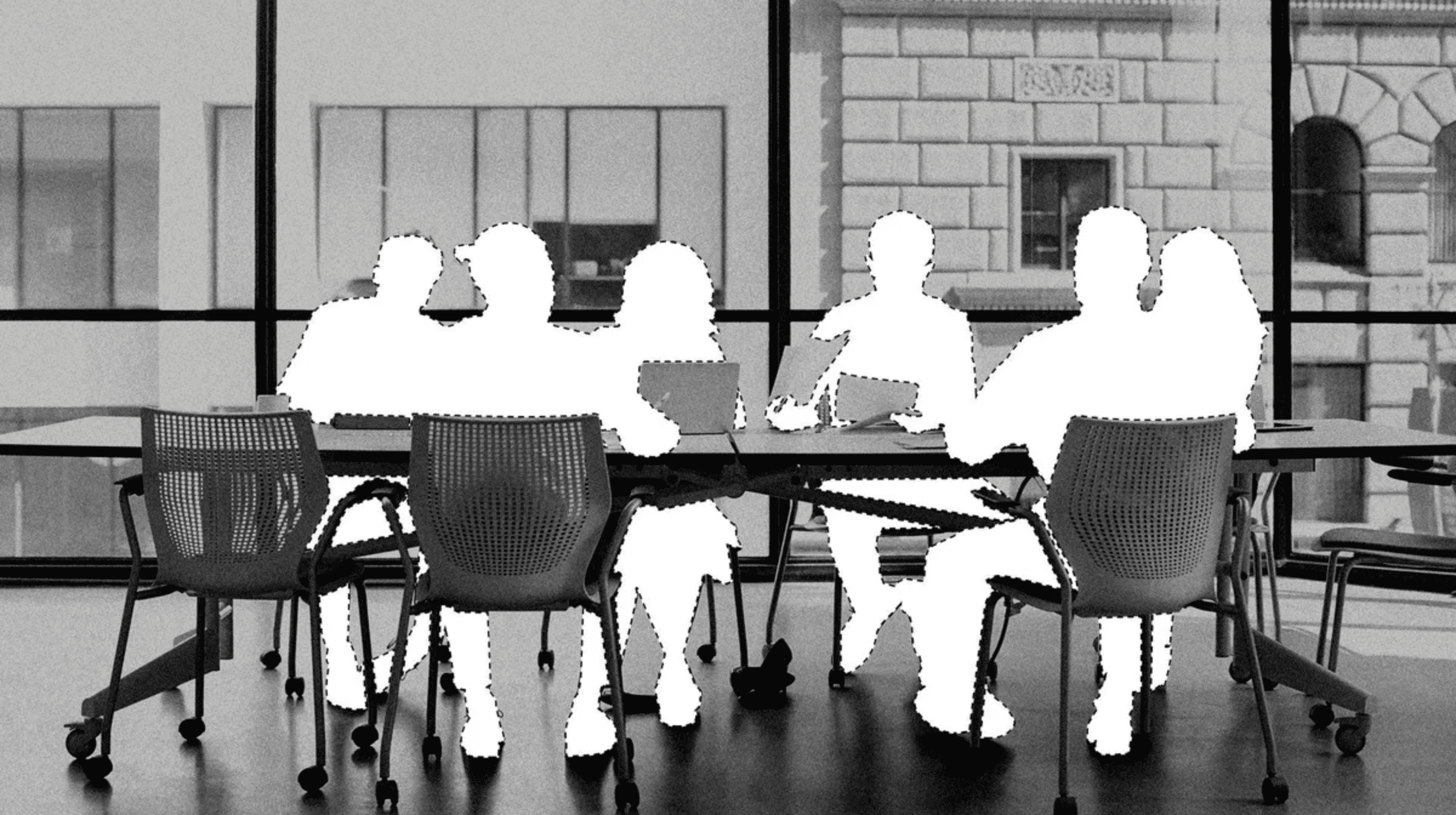 a black and white meeting room, where the six people are cut out