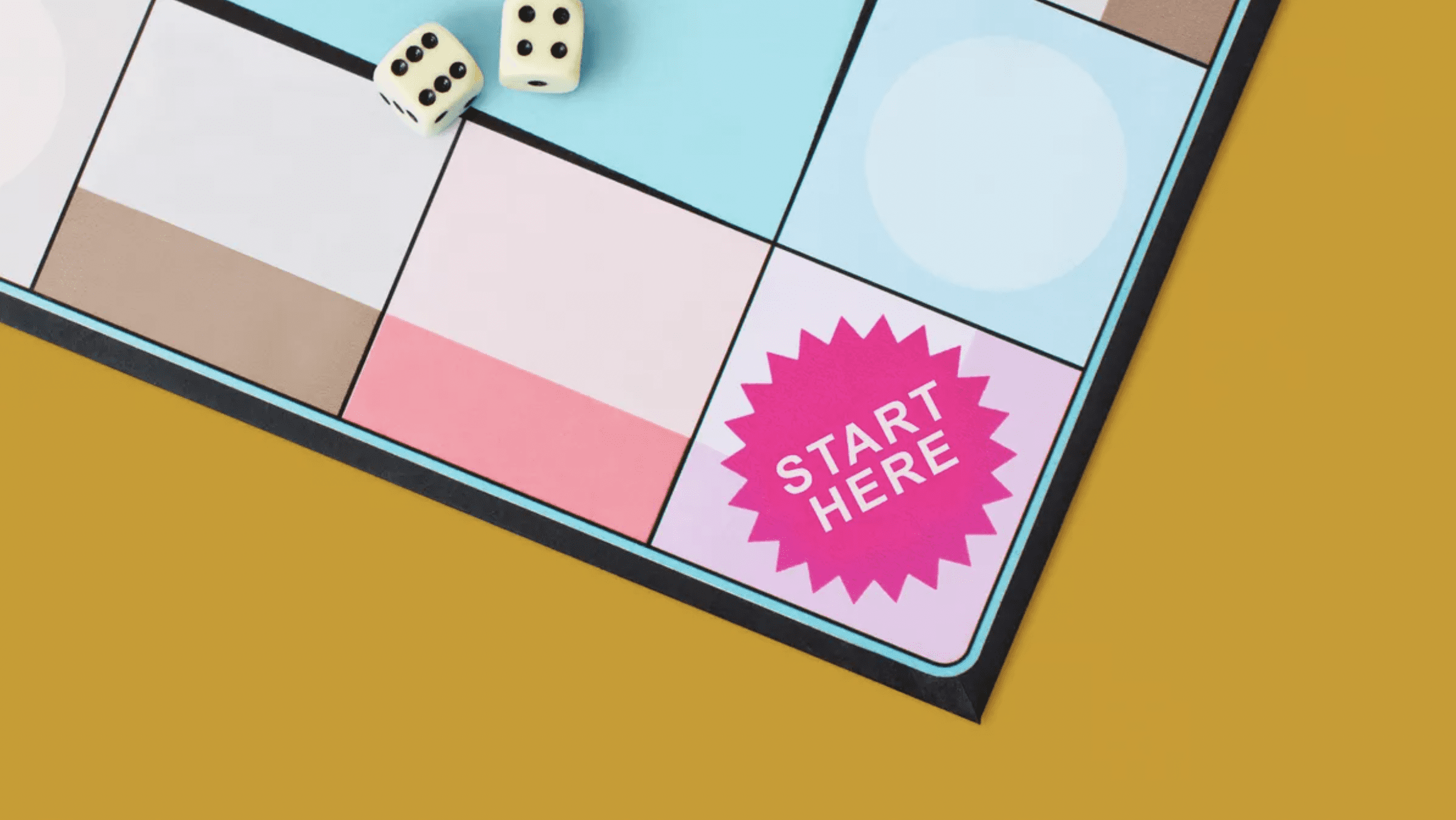 The corner of a board game that says Start Here