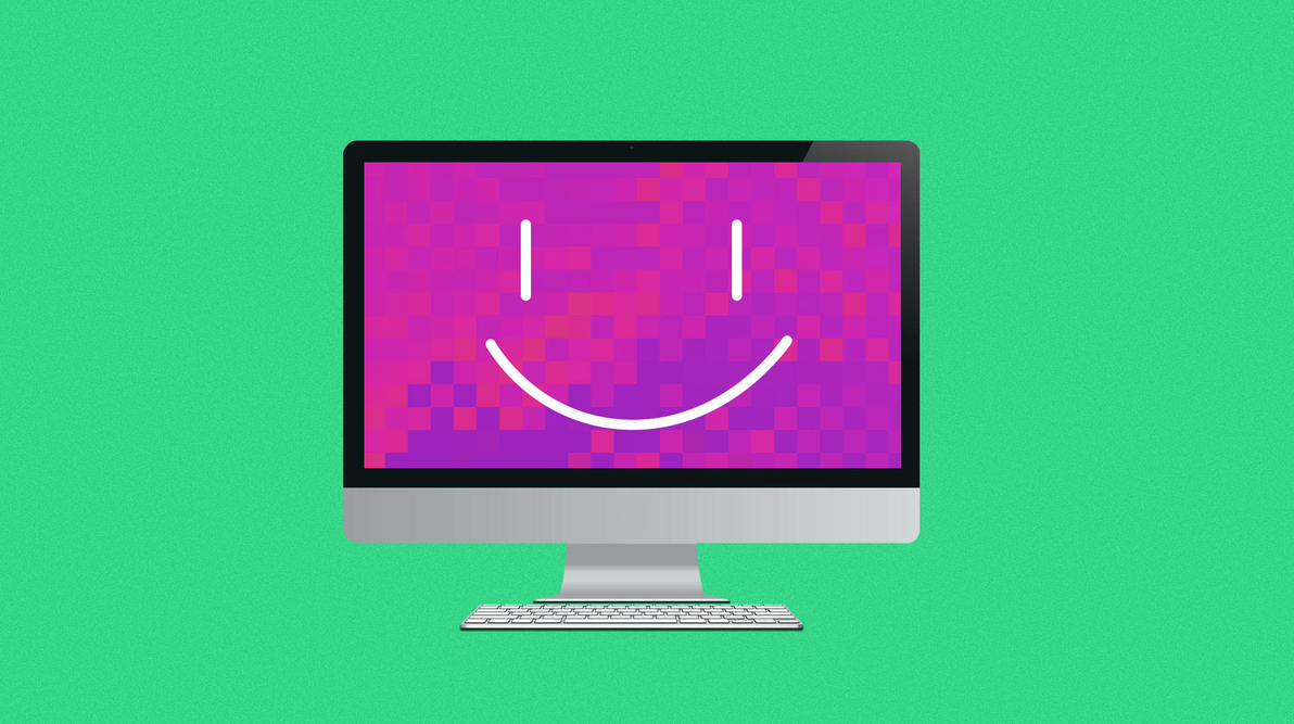 a computer screen with a smiley face