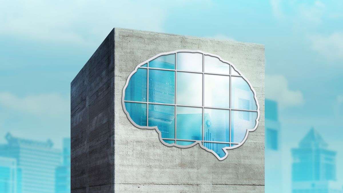 The top of a corporate building where the windows form the shape of a brain